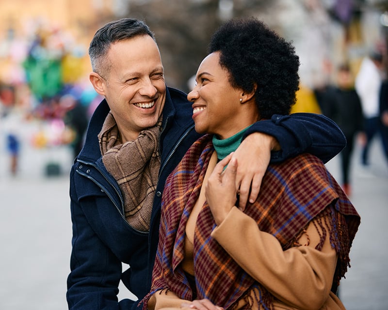 Couple enjoying clear vision thanks to restorative lens exchange RLE procedure at eye surgery clinic in Minneapolis, Minnesota