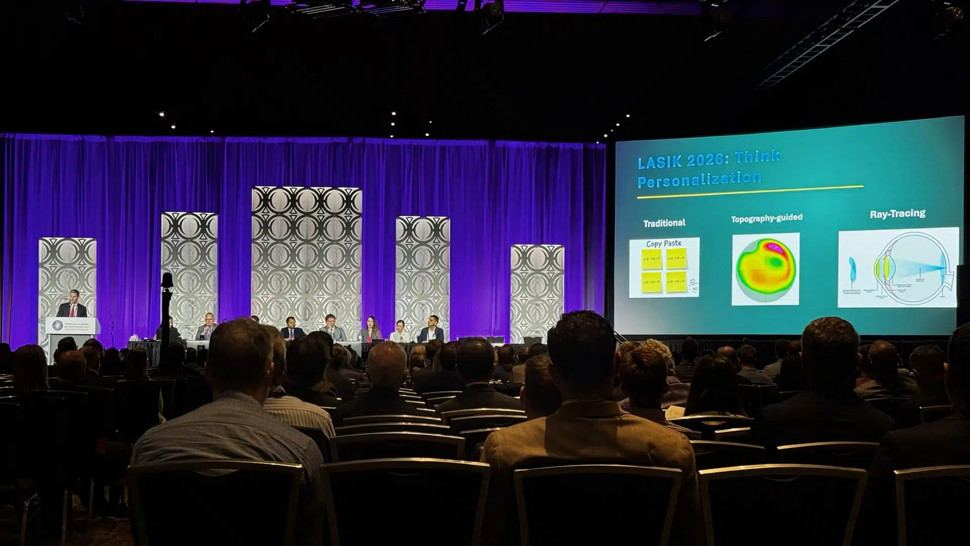 Conference attendees watch a presentation on personalized LASIK and ray tracing technology at AAO 2026 Refractive Surgery Subspecialty Day in New Orleans.